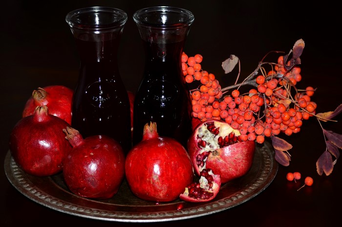 Pomegranate juice with berries and pomegranates