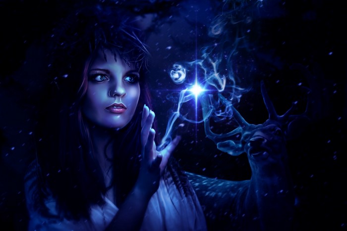 Witch casting magic with a deer in the night