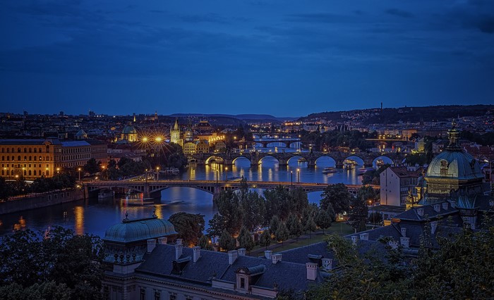 Prague cityscape with Charles Bridge at night