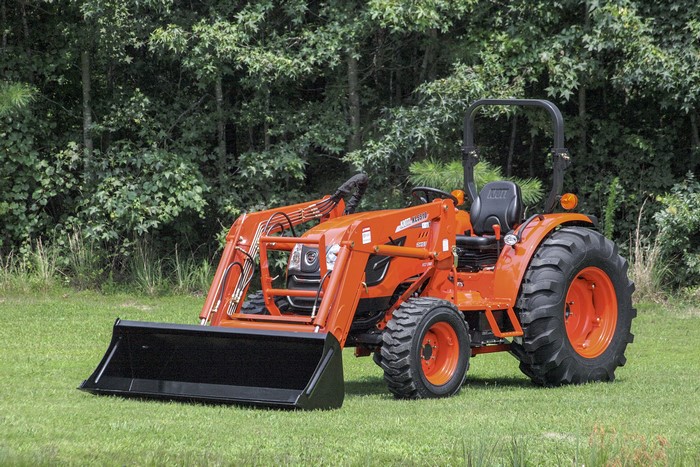 Kioti DK5510 tractor with front loader on grass
