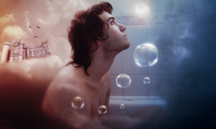 Man in a bathtub with bubbles and a castle in the clouds