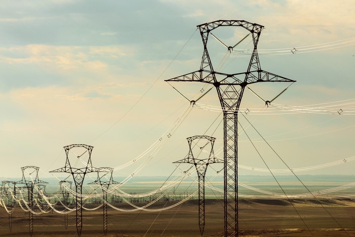 Power lines stretching across a vast landscape