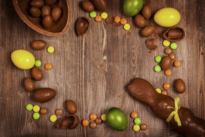 Easter Chocolate Eggs and Bunny on Wood
