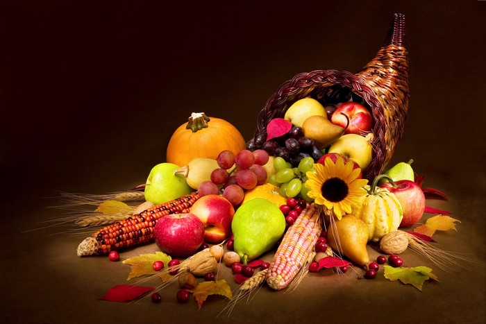 Cornucopia filled with fruits, vegetables, and grains