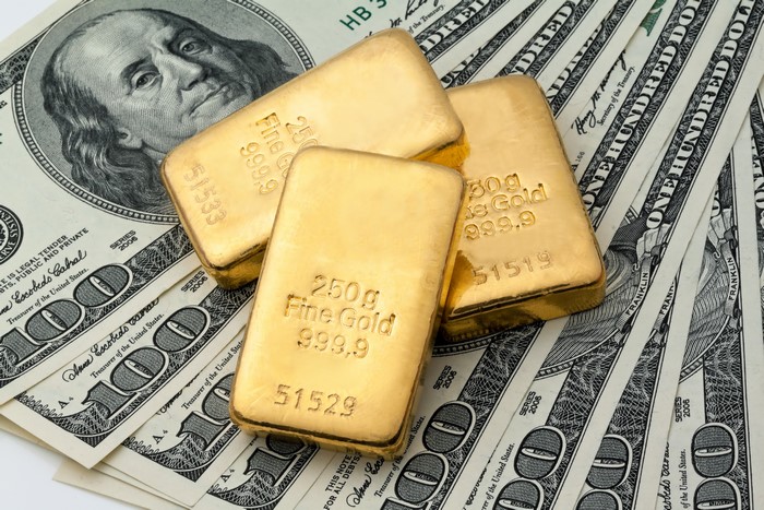Gold Ingots on US Dollar Bills