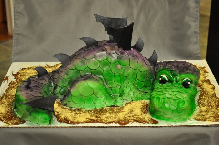 Dragon cake with green and purple scales
