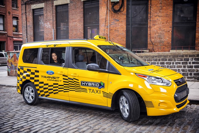 Yellow Ford Transit Connect Hybrid Taxi