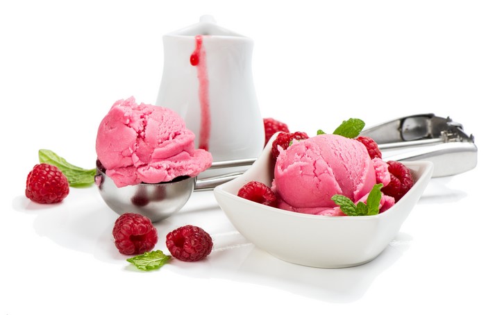 Raspberry ice cream with fresh raspberries and mint