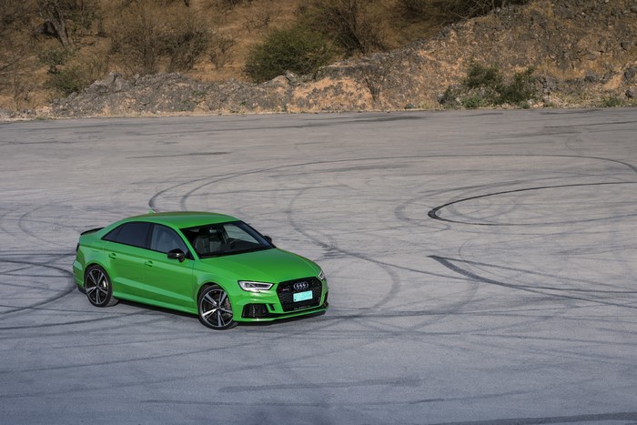 Green Audi RS 3 Sedan on a Paved Surface