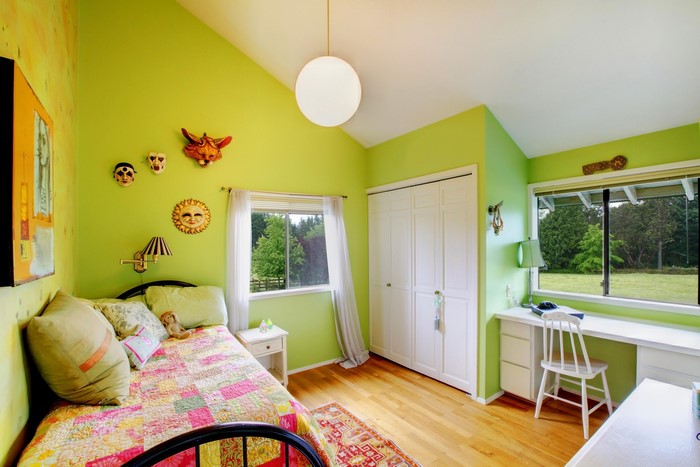 Children's room with bed, desk, and closet