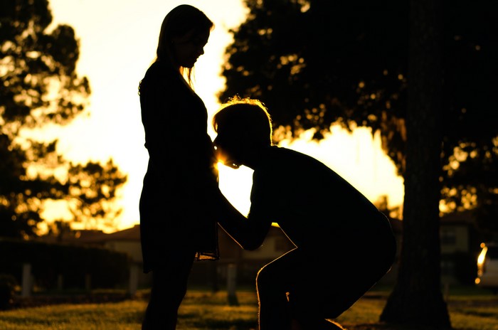 Couple in silhouette at sunset