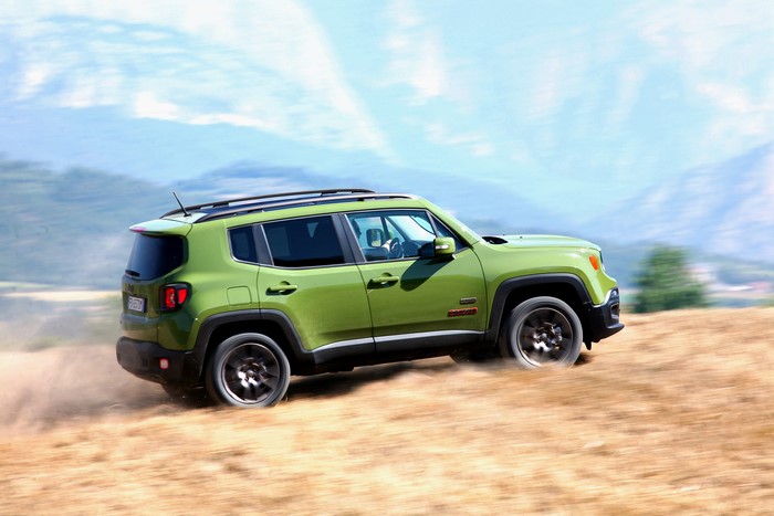Green Jeep Renegade 75th Anniversary driving off-road