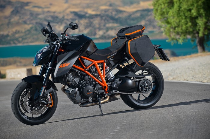 Black KTM 1290 Super Duke R motorcycle with saddlebags