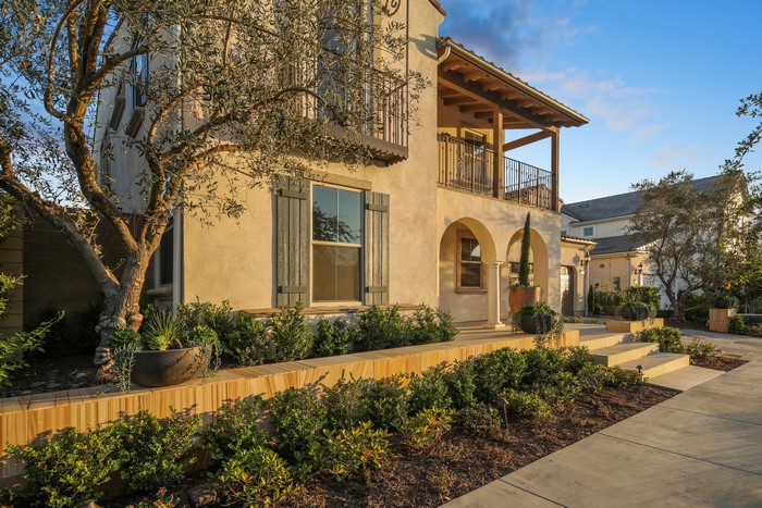 Mediterranean Style House with Balcony and Landscaping