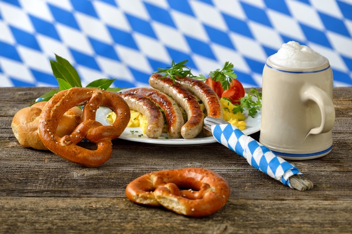 Still-life of sausages, pretzels, and beer mug