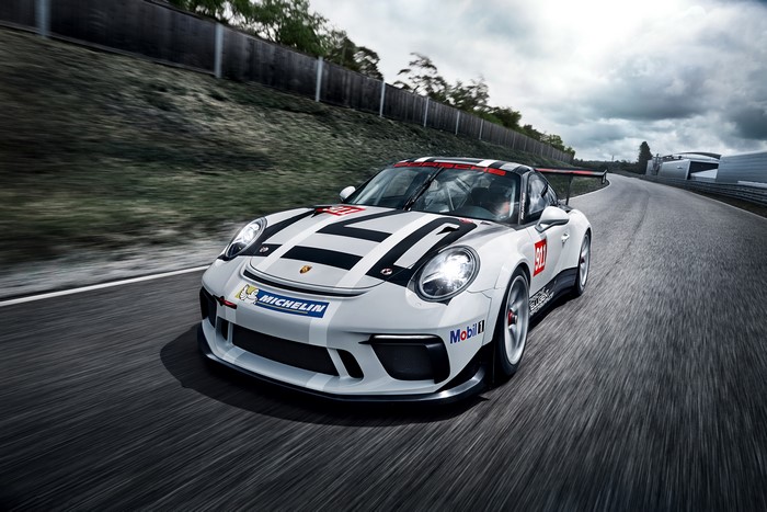 White Porsche 911 GT3 Cup on a Racetrack