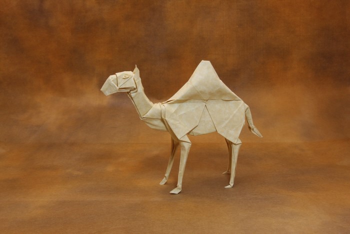 Origami Camel on Brown Background