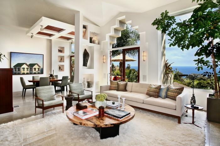 Living room with ocean view and dining area
