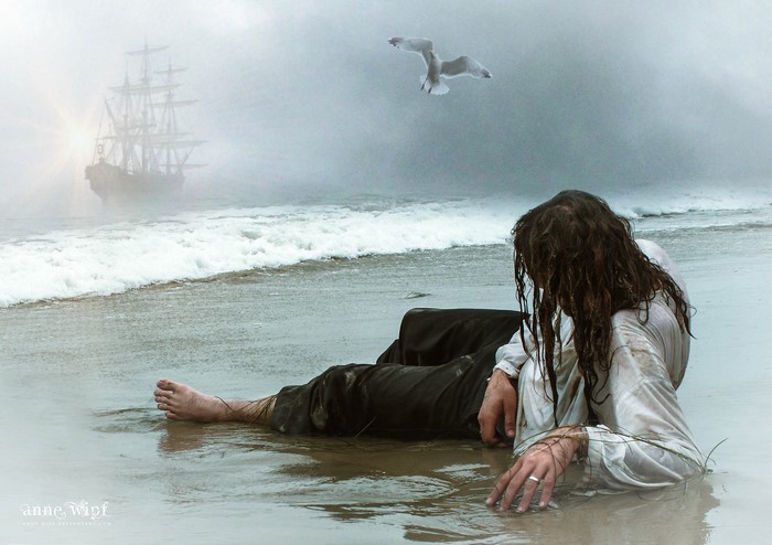 Pirate washed ashore with a ship in the fog
