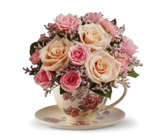 Rose bouquet in a teacup and saucer