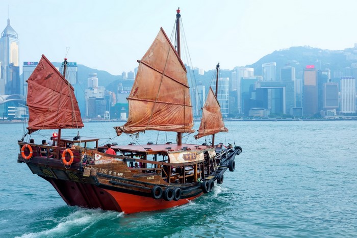 Traditional Chinese Junk Boat in Hong Kong Harbor