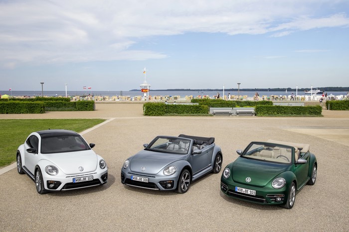 Three Volkswagen Beetle Cabriolets at the Beach