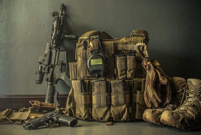 Combat equipment with assault rifle and pistol
