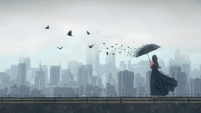Woman with umbrella in rain with birds and city skyline