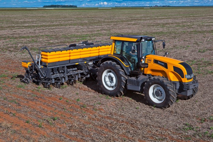 Valtra BH135i Tractor with Planter in a Field