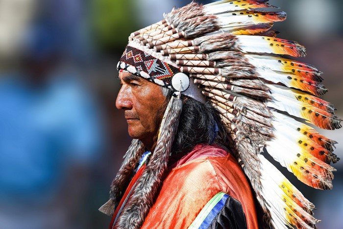 Peruvian Man Wearing Traditional War Bonnet