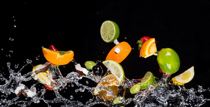 4K Vibrant Fruit Splash with Black Background