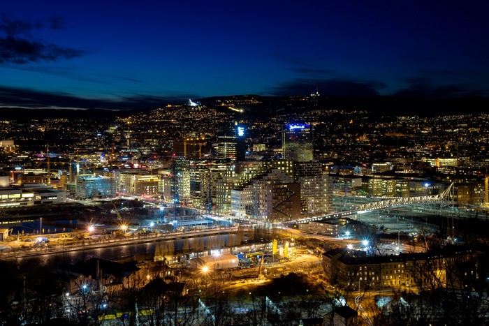 Oslo, Norway cityscape at night with illuminated buildings