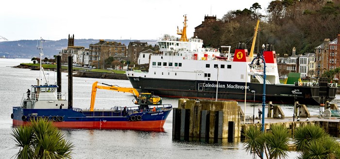 Caledonian MacBrayne ferry and barge in Rothesay Harbour