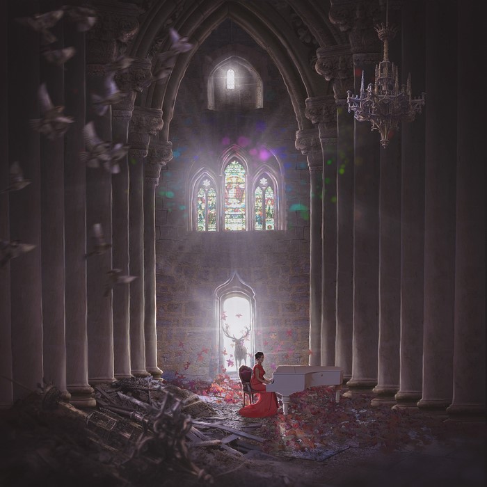Woman playing piano in ruined temple with deer