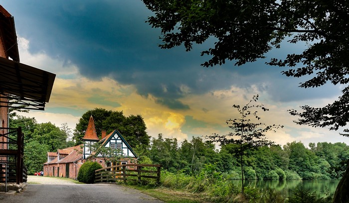 Brick buildings and lake in Ahausen, Germany