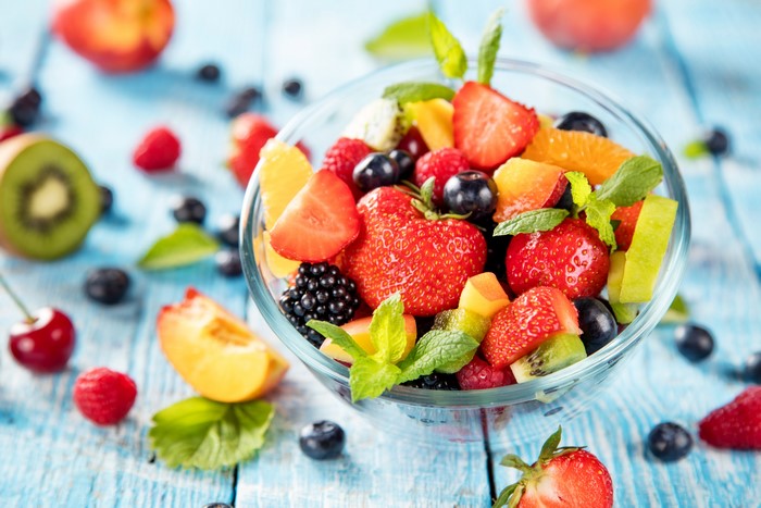 Fruit salad with strawberries, blueberries, and peaches