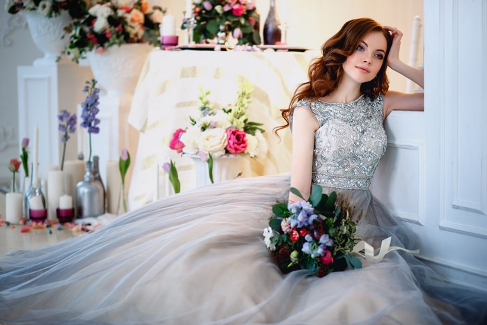 Woman in a wedding dress with a bouquet