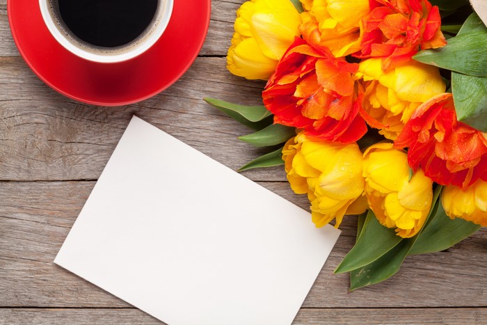 Tulips and coffee with a greeting card template