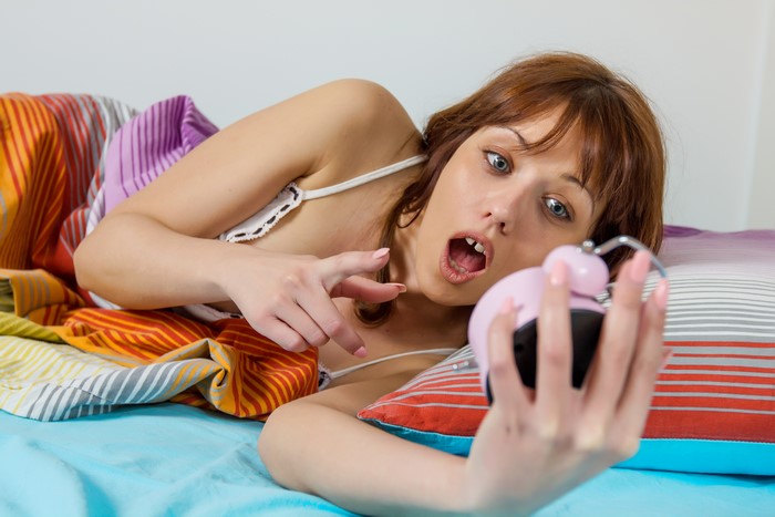 Woman shocked by alarm clock