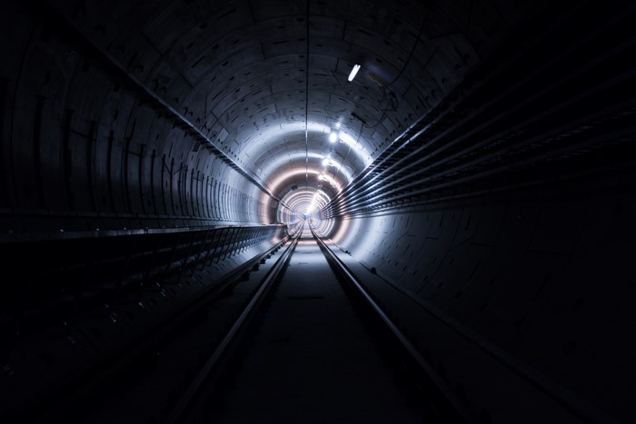 Underground tunnel with railroad tracks