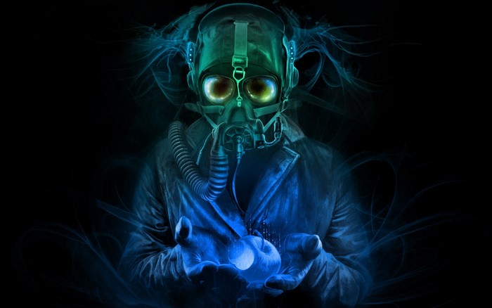 Man in gas mask holding glowing apple