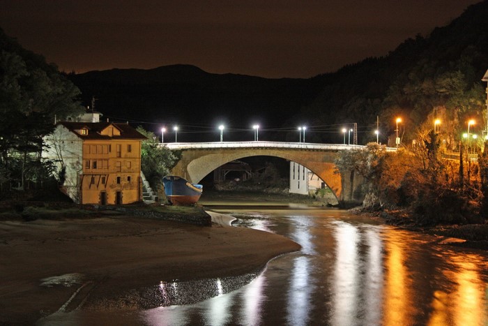 Bridge over river at night in Lekeitio, Basque Country, Spain