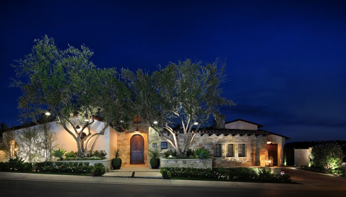 Luxury Mediterranean House at Night with Trees