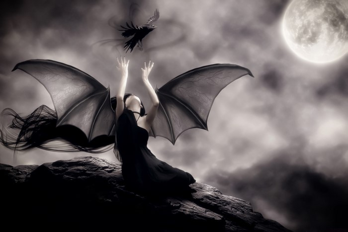 Gothic Woman with Bat Wings Under Full Moon