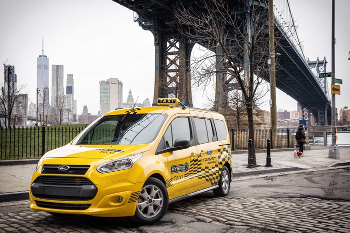 Yellow Ford Transit Connect Hybrid Taxi in New York City
