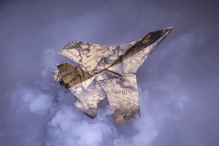 Origami fighter jet made from a map