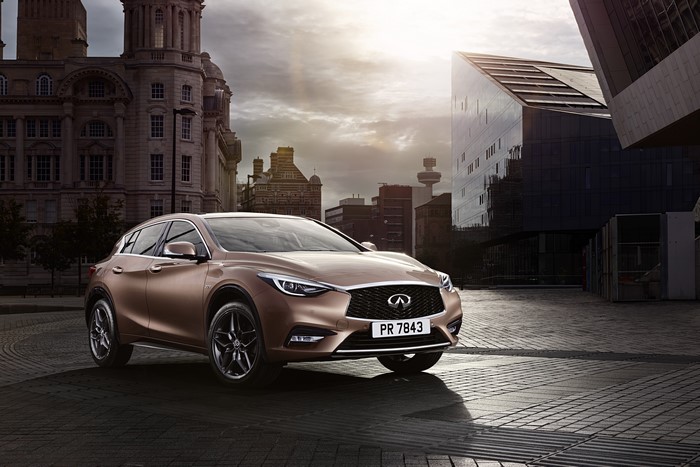 Brown Infiniti Q30 Crossover in City