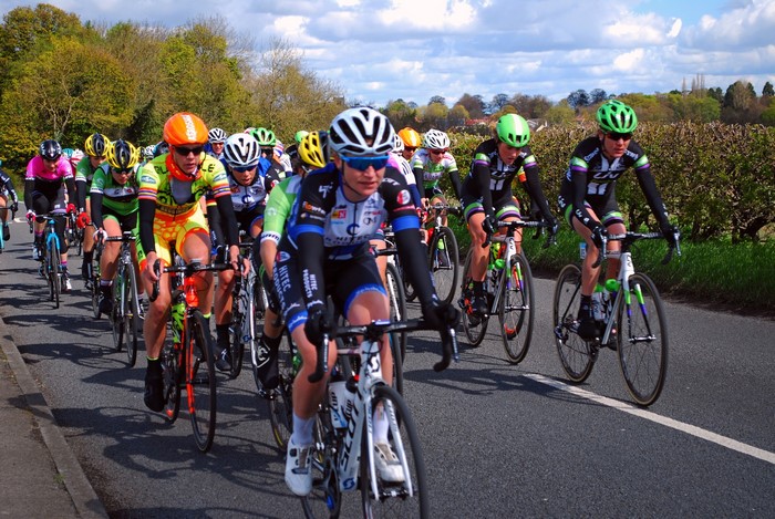 Cyclists in a race on a road