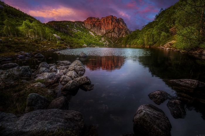 Lake and mountains at sunset in Norway