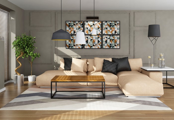 Modern living room with sectional sofa and abstract art